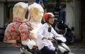 Во Вьетнаме вводятся штрафы за неправильное ношение мотоциклетного шлема
